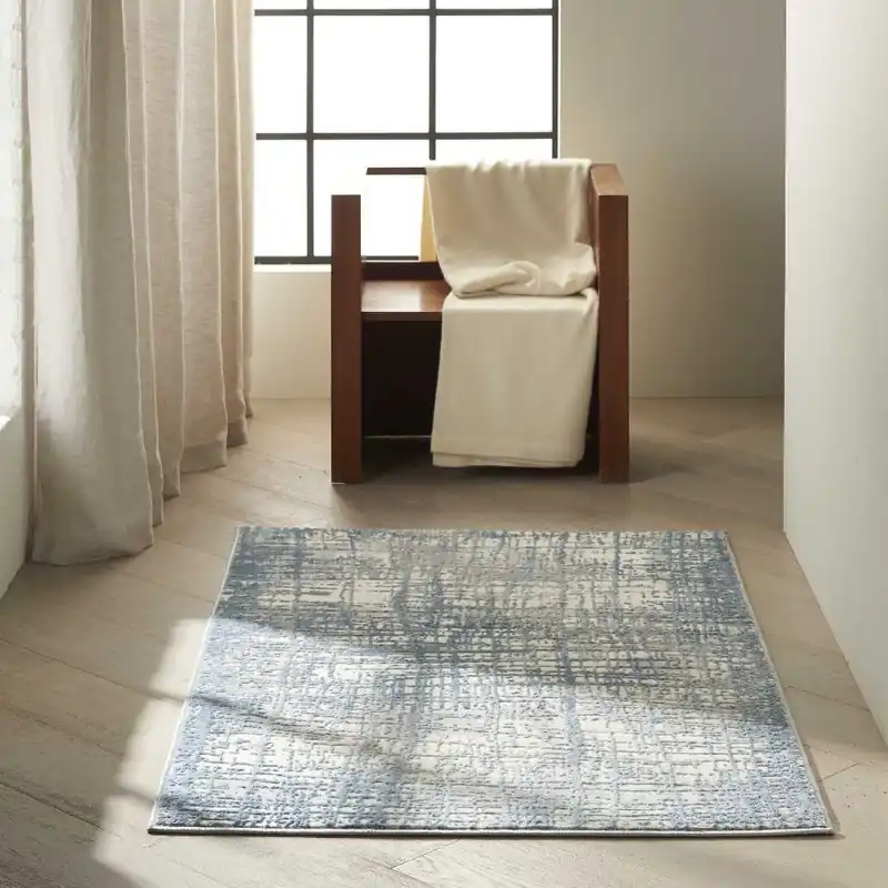 Koberec CALVIN KLEIN RUSH CK950 sloní kost / modrý Dokud Zásoby Vydrží